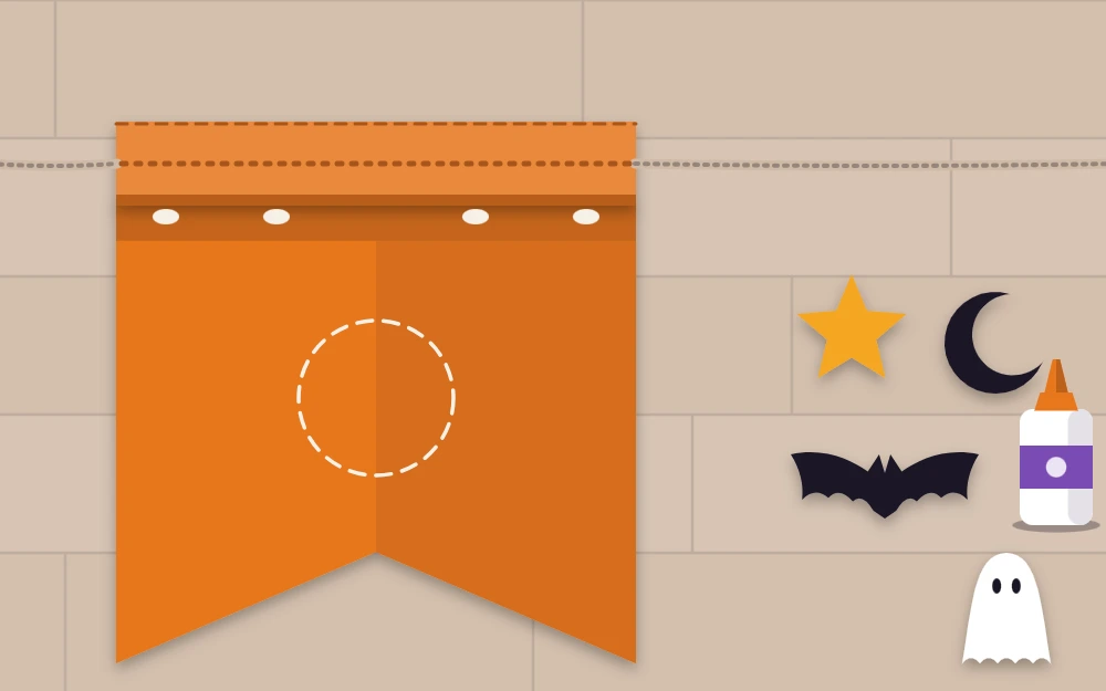 The top edge of a pennant folded over twine with small felt shapes beside it